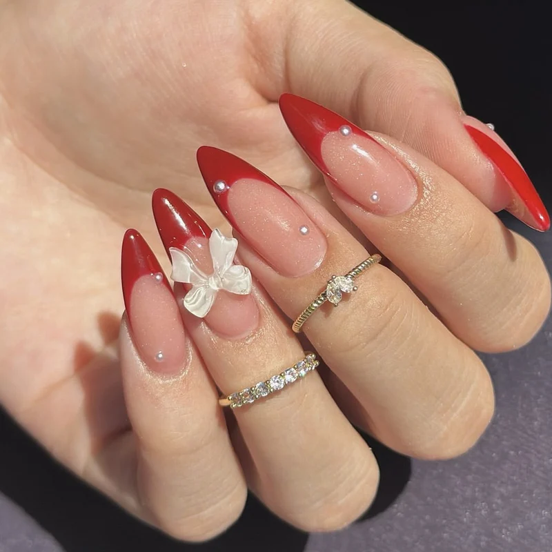 Elegant Stiletto Nail Art Extensions with 3D Butterfly Accents Stornfield