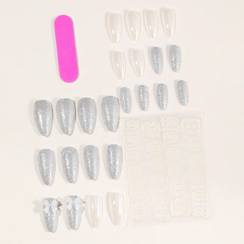 Elegant Stiletto Nail Art Extensions with 3D Bow Accents Stornfield