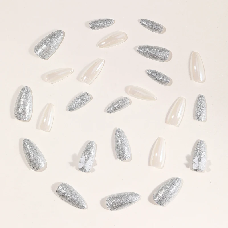 Elegant Stiletto Nail Art Extensions with 3D Bow Accents Stornfield
