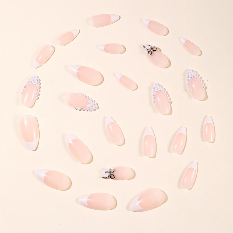 Elegant Pearl-Accentuated Stiletto Nail Art Stornfield