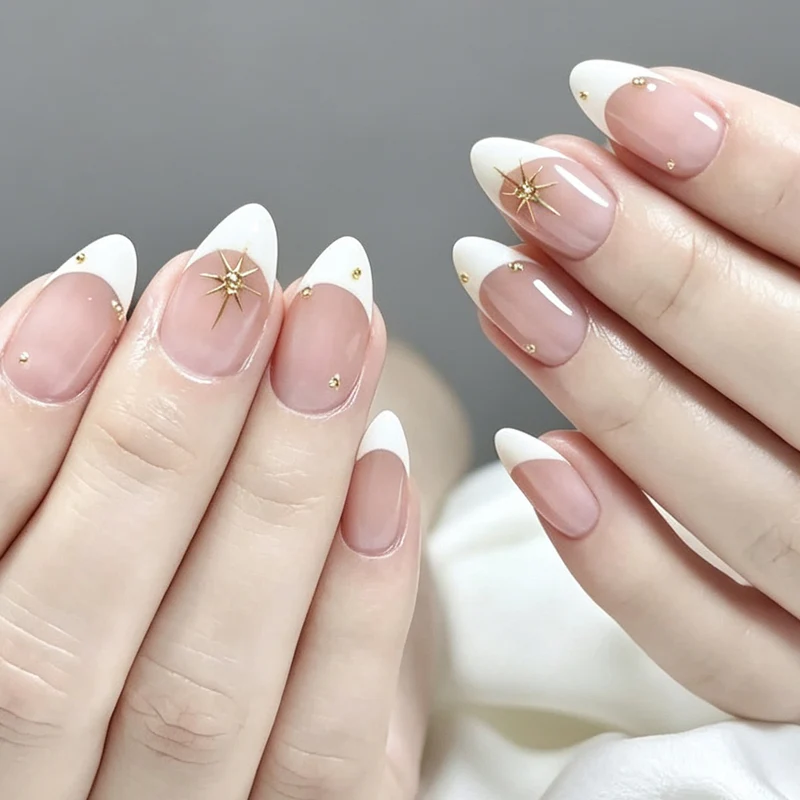 Elegant French Tip Nail Art with Gold Accents Stornfield