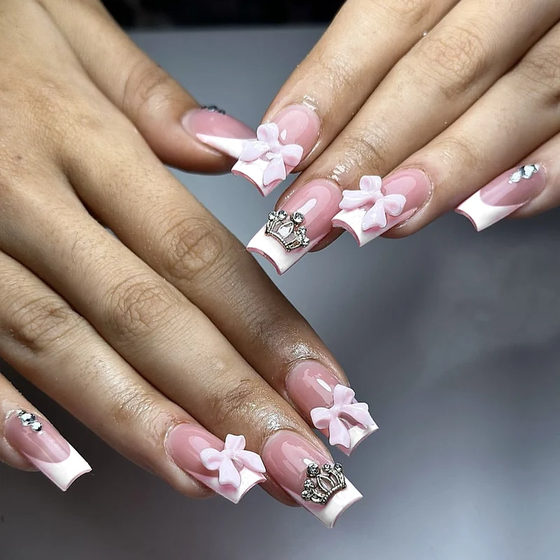 Elegant Crown-Embellished Nail Art Extensions Stornfield