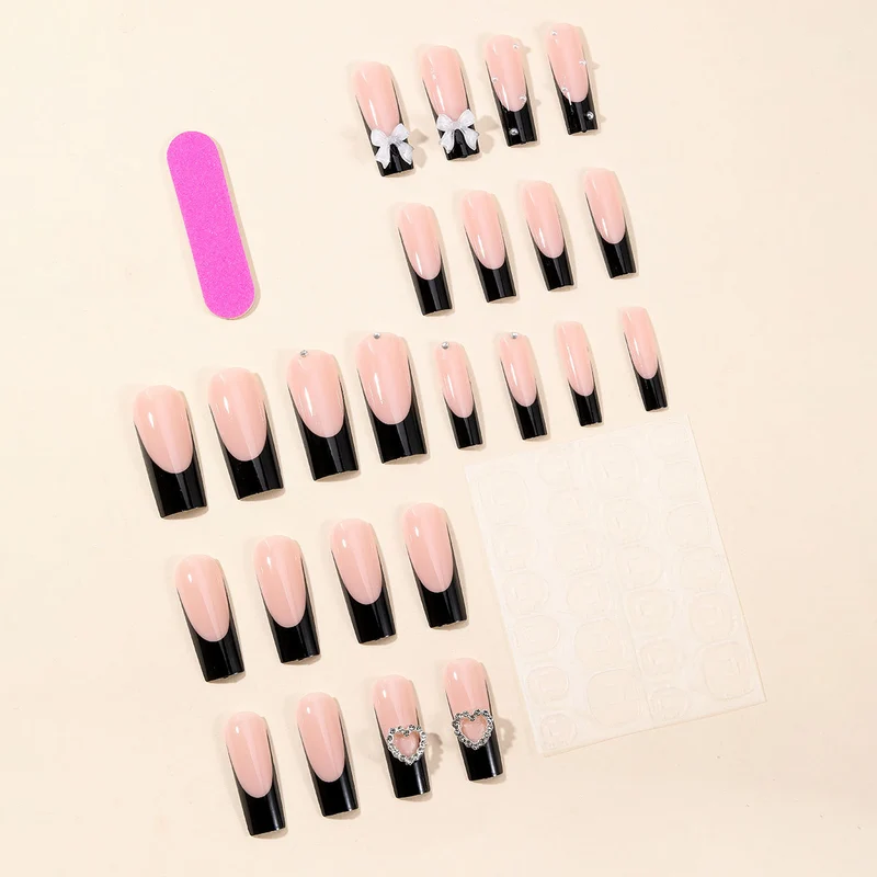 Elegant 3D Bow and Heart Nail Art Stornfield