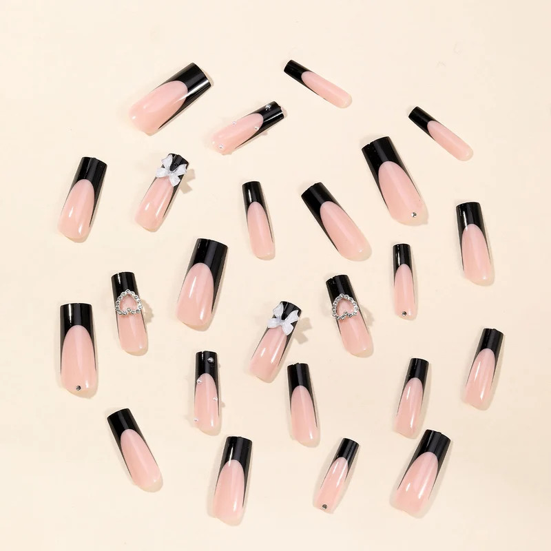 Elegant 3D Bow and Heart Nail Art Stornfield