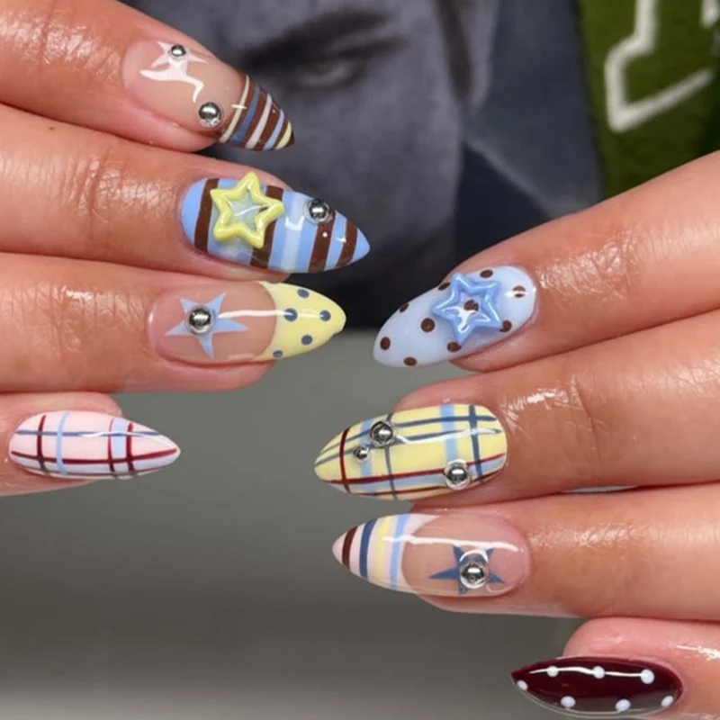 Decorative Stiletto Nail Art with Star Accents Stornfield
