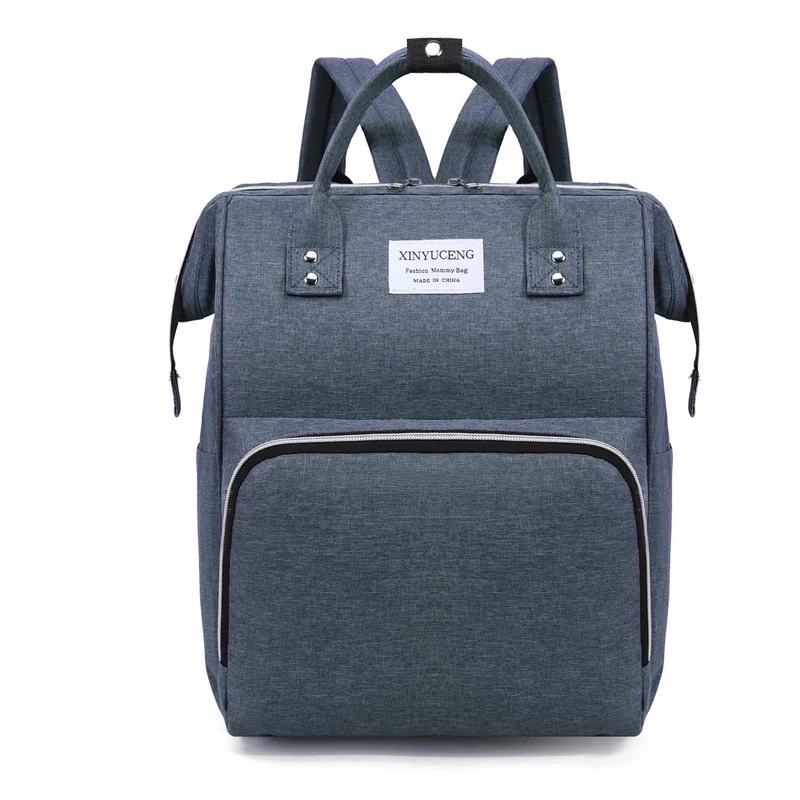 Multi-Taschen Baby Pflege Rucksack Karnz