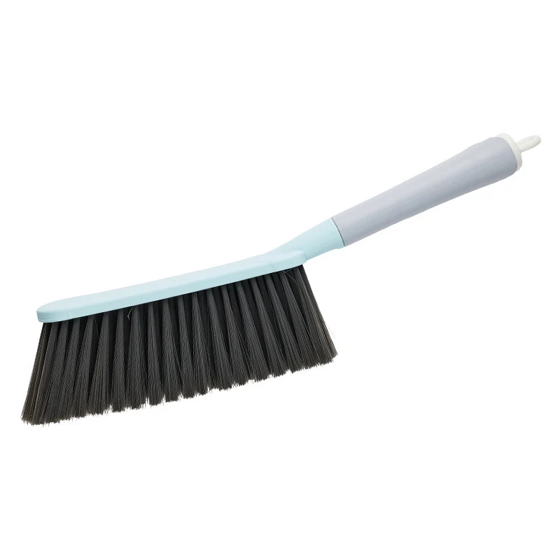Bed brush with long handle, soft bristles