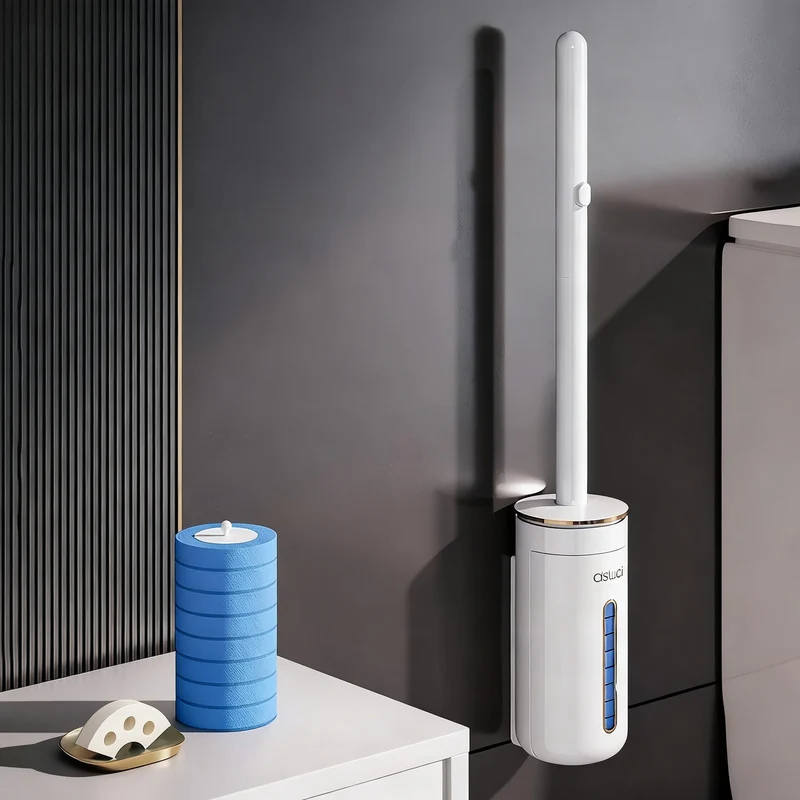 Toilet brush with interchangeable heads