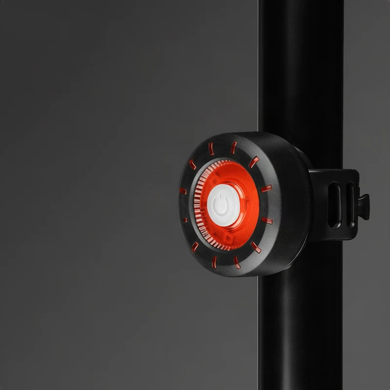 Round bicycle rear light with USB charging