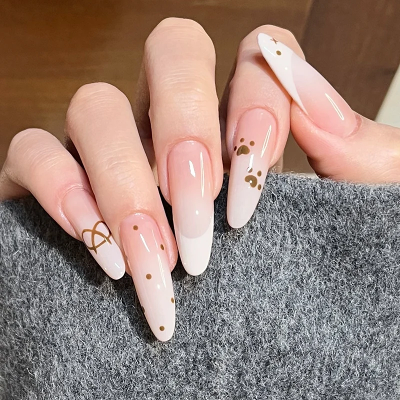 Glamorous Stiletto Press-On Nail Design with Elegant Gold Accents Stornfield