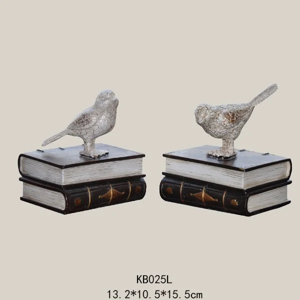 Dekorative Buchstützen mit Vogel-Figuren