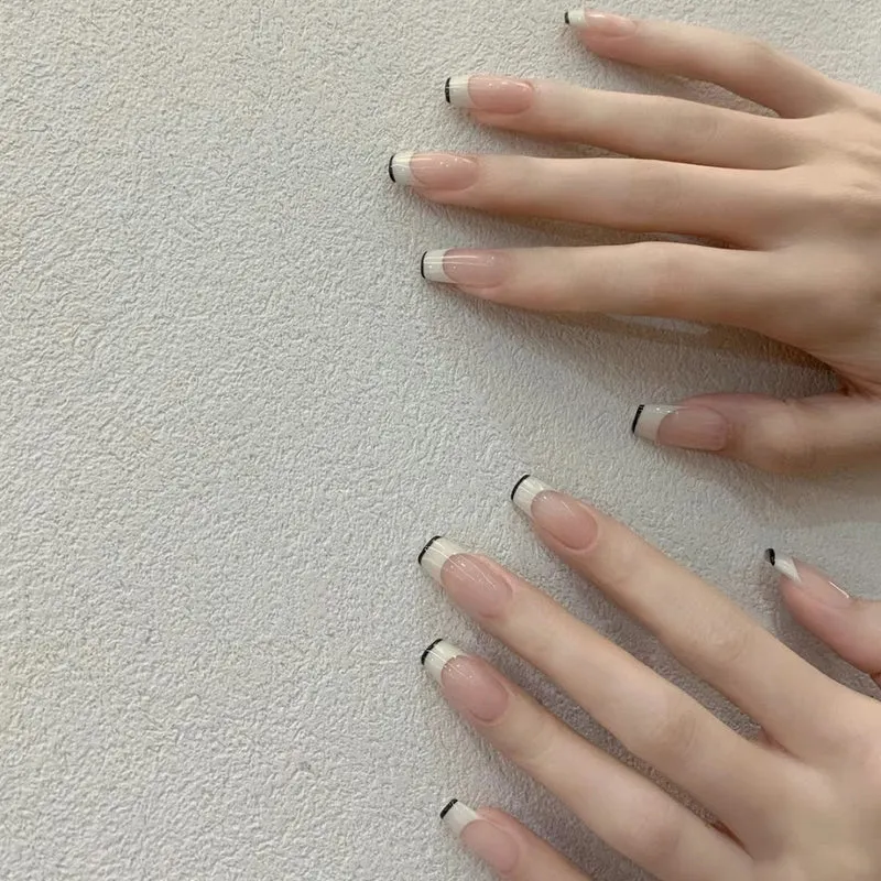 French Tip Press-On Nails with Elegant Black Detailing Stornfield