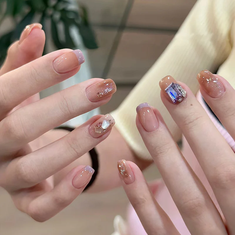 Elegant Press-On Nail Set with Artistic Glitter and Decorative Accents Stornfield