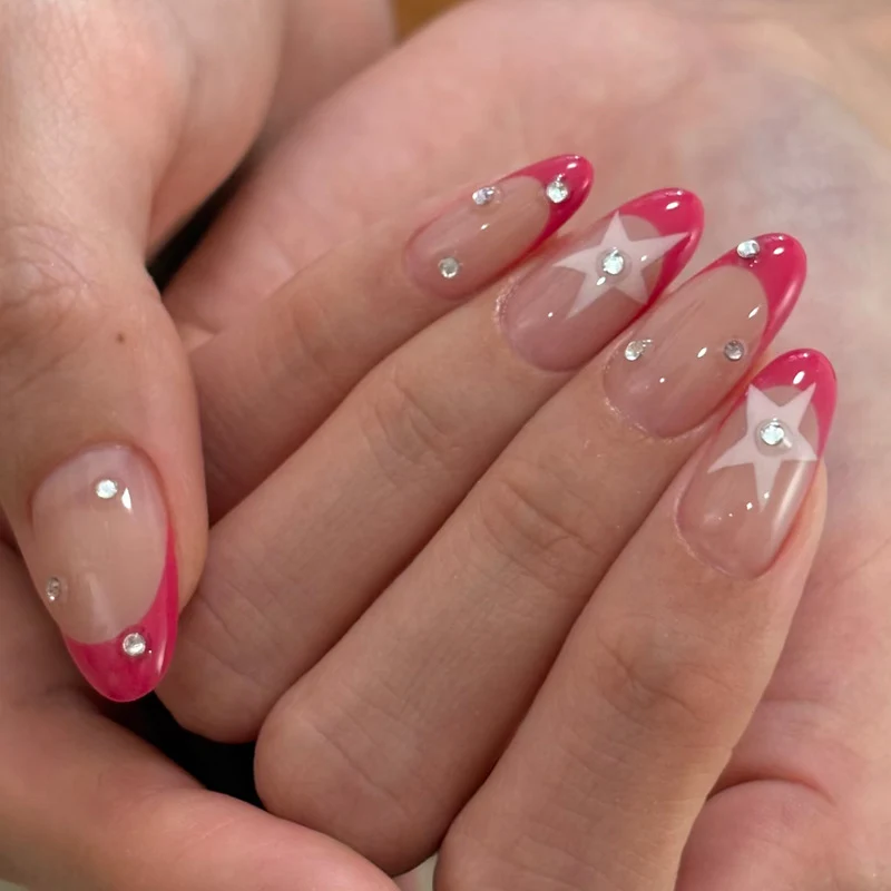 Elegant Press-On Nail Design with Star and Rhinestone Accents Stornfield