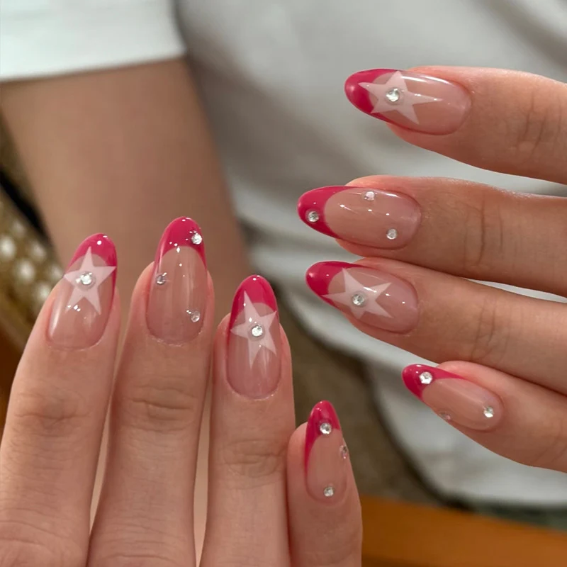 Elegant Press-On Nail Design with Star and Rhinestone Accents Stornfield