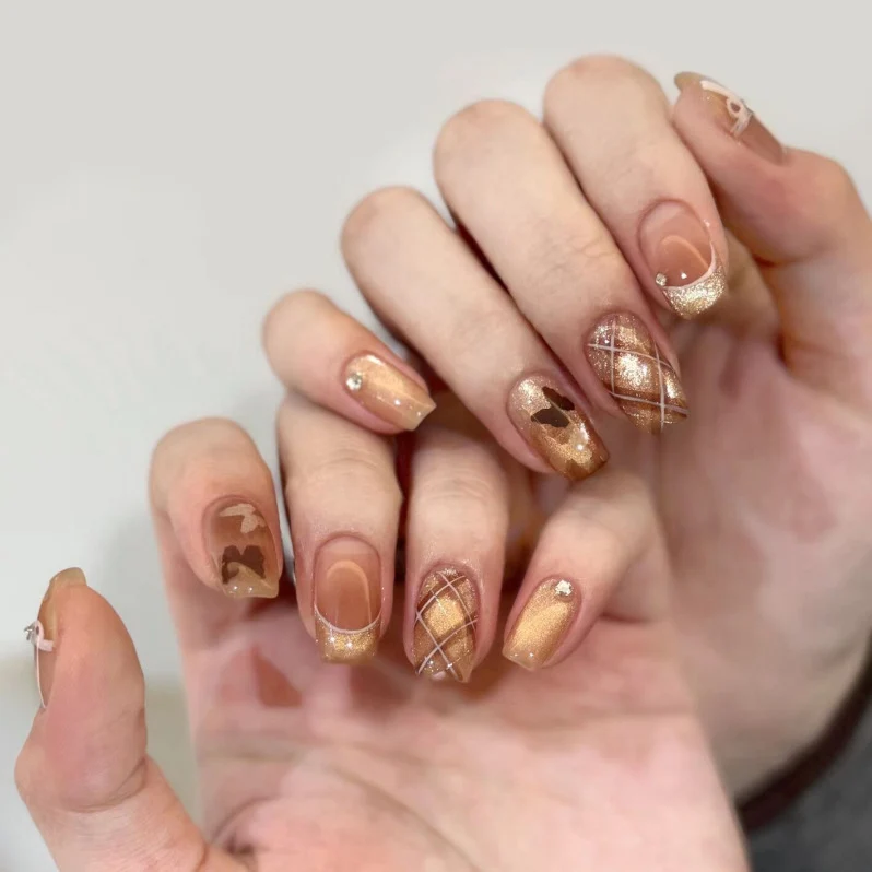 Elegant Press-On Nail Design with Rhinestone Accents Stornfield
