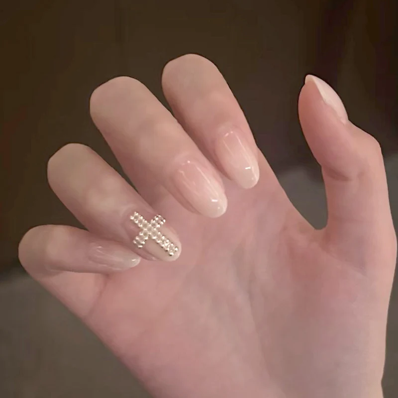 Elegant Press-On Nail Art with Cross Design Stornfield
