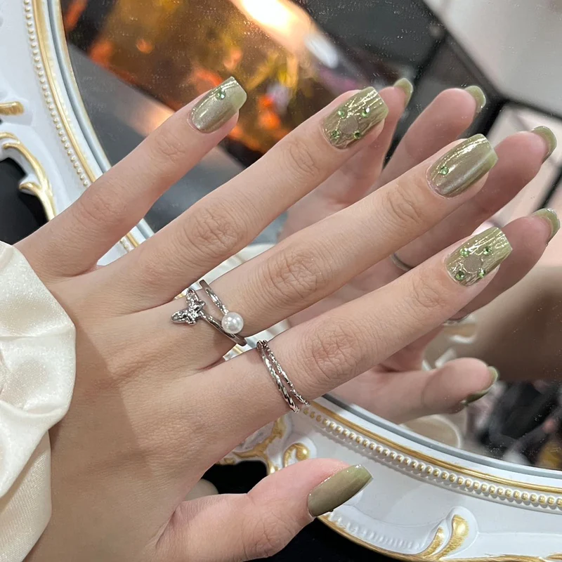 Elegant Long Press-On Nails Set with Artistic Tips Stornfield