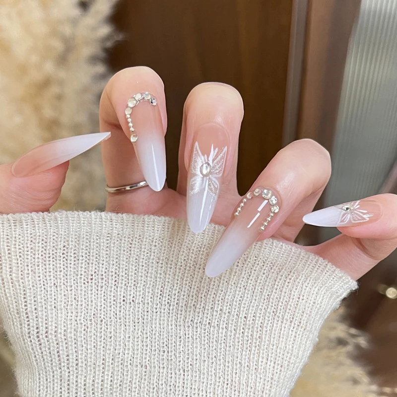 Elegant Stiletto Press-On Nails with Pearl and Floral Designs Stornfield