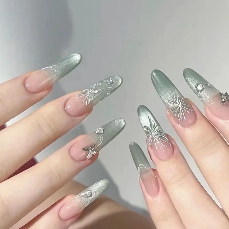 Elegant Stiletto Press-On Nails with Intricate Floral and Gemstone Accents Stornfield