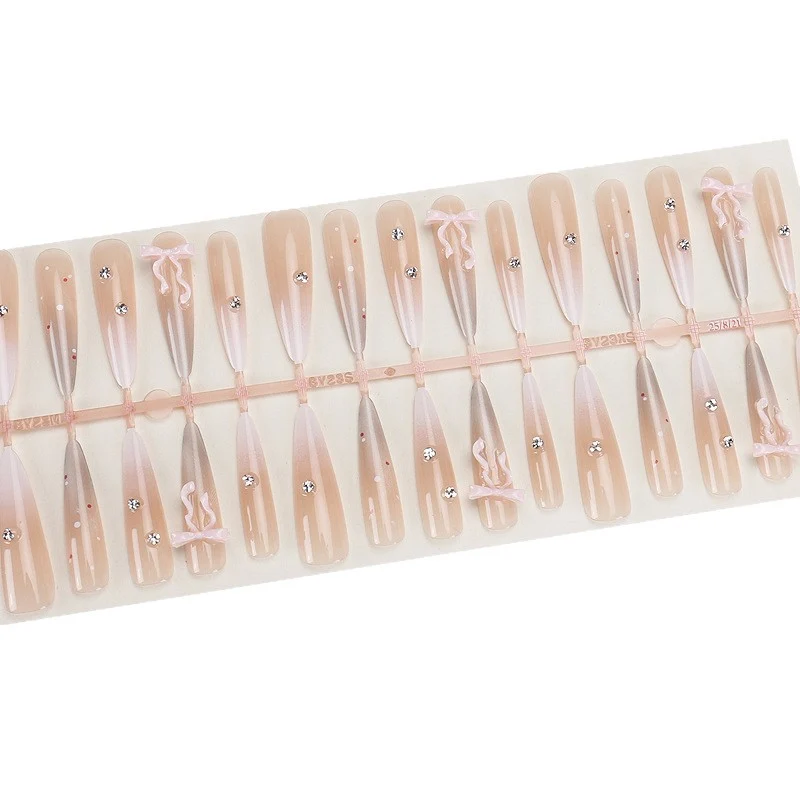 Elegant Stiletto Press-On Nails with Decorative Bow and Rhinestone Accents Stornfield