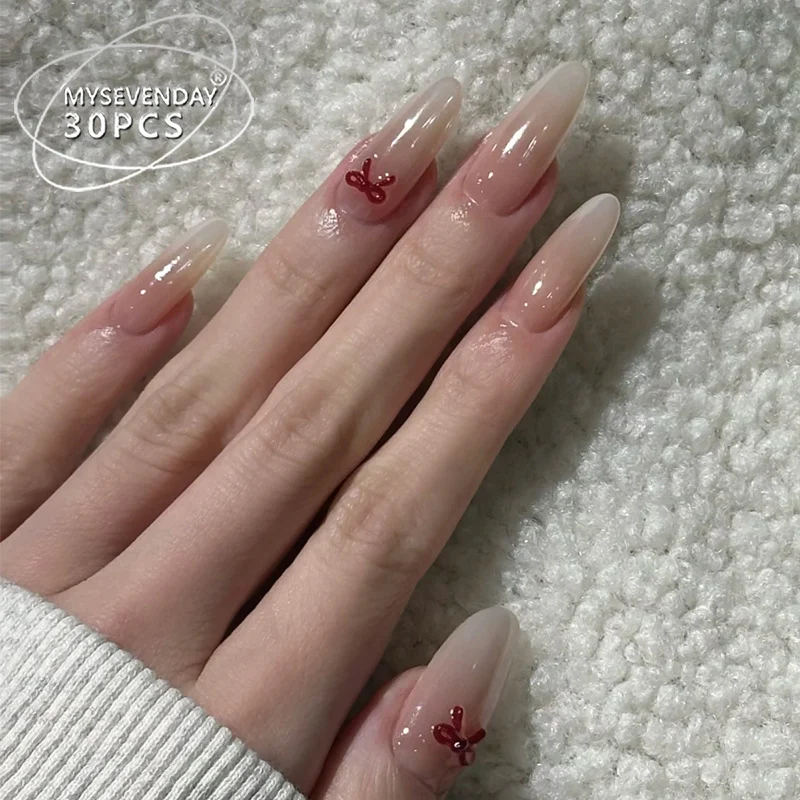 Elegant Stiletto Press-On Nails with Decorative Bow Accents Stornfield