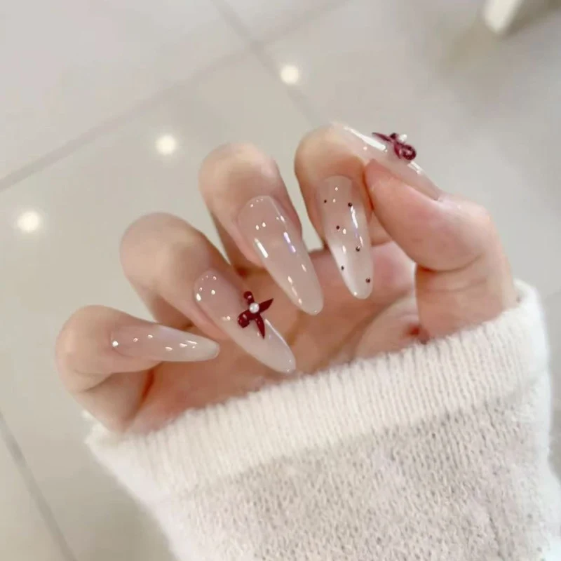 Elegant Stiletto Press-On Nails with Decorative Accents Stornfield