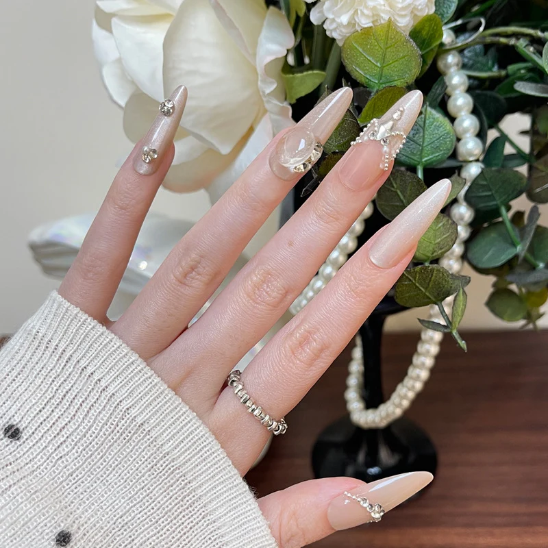 Elegant Stiletto Press-On Nail Art with Rhinestone and Pearl Accents Stornfield