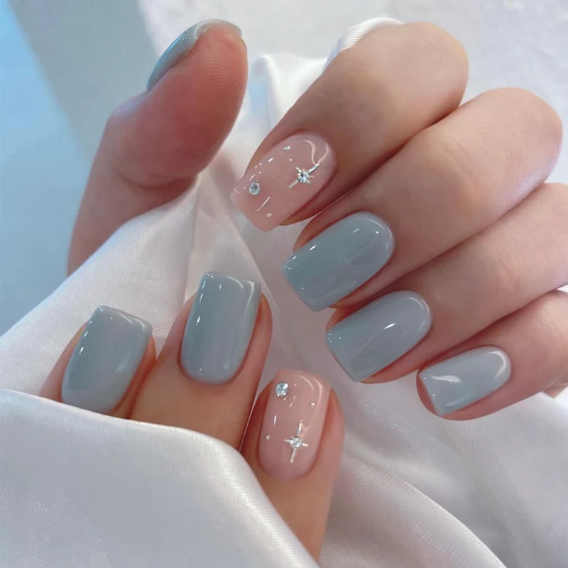 Elegant Stiletto Press-On Nail Art with Rhinestone Accents Stornfield