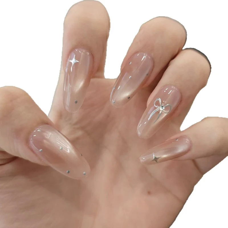 Elegant Stiletto Nail Tips with Bow Accents Stornfield