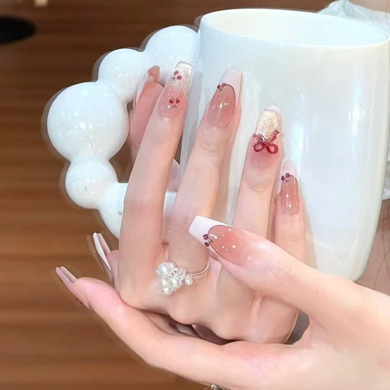 Press-On Nail Art with Elegant Floral and Bow Designs Stornfield