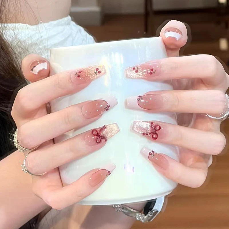 Press-On Nail Art with Elegant Floral and Bow Designs Stornfield