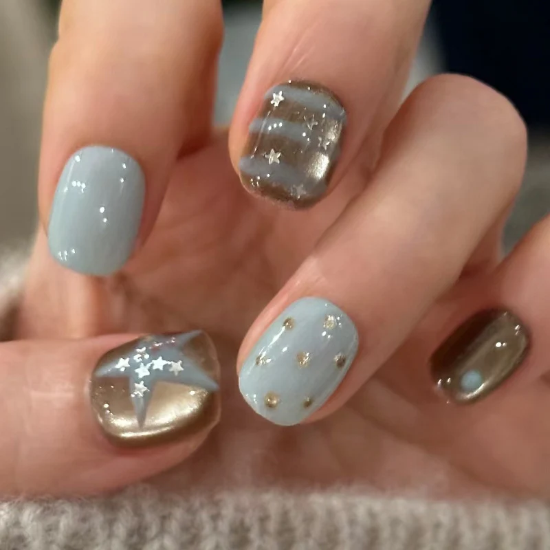 Premium Artistic Press-On Nail Set with Star and Metallic Accents Stornfield
