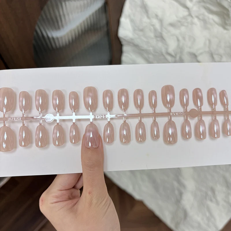 Glossy Nail Art with Subtle Stripes Stornfield