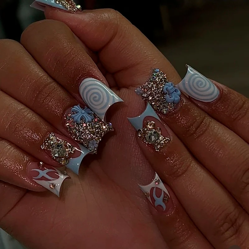 Artful nail art with cute animal motifs and glitter accents Stornfield