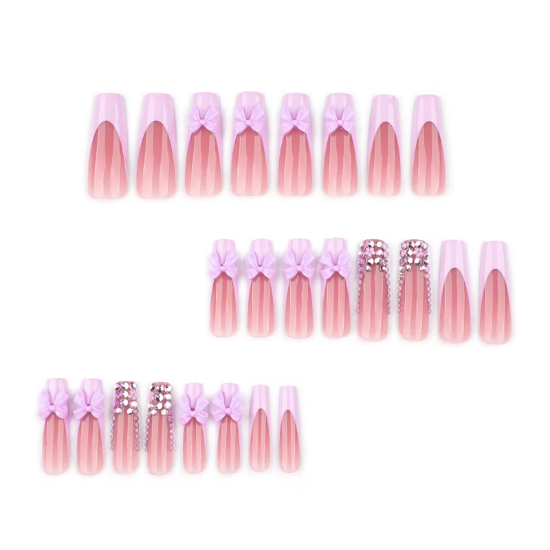 Artful Nail Art with Rhinestone Accents and Bows Stornfield