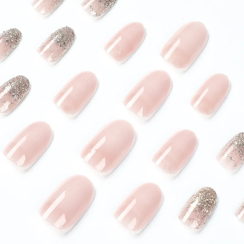 Artful nail art with rhinestone embellishments and elegant gradient color Stornfield