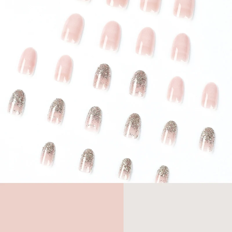 Artful nail art with rhinestone embellishments and elegant gradient color Stornfield