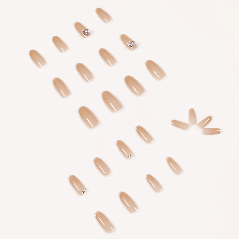 Artful Nail Art with Rhinestone Embellishments Stornfield