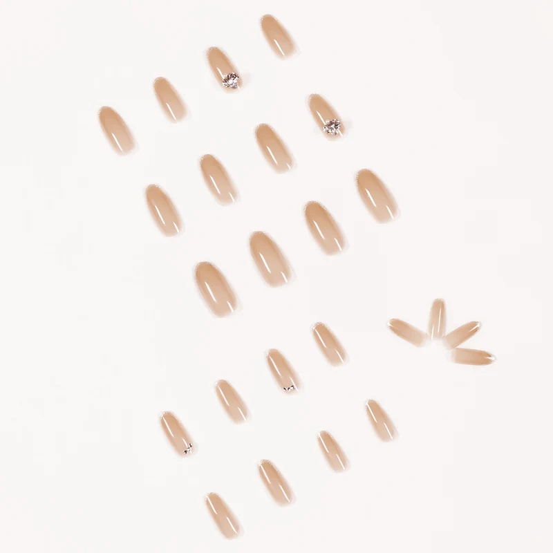 Artful Nail Art with Rhinestone Embellishments Stornfield