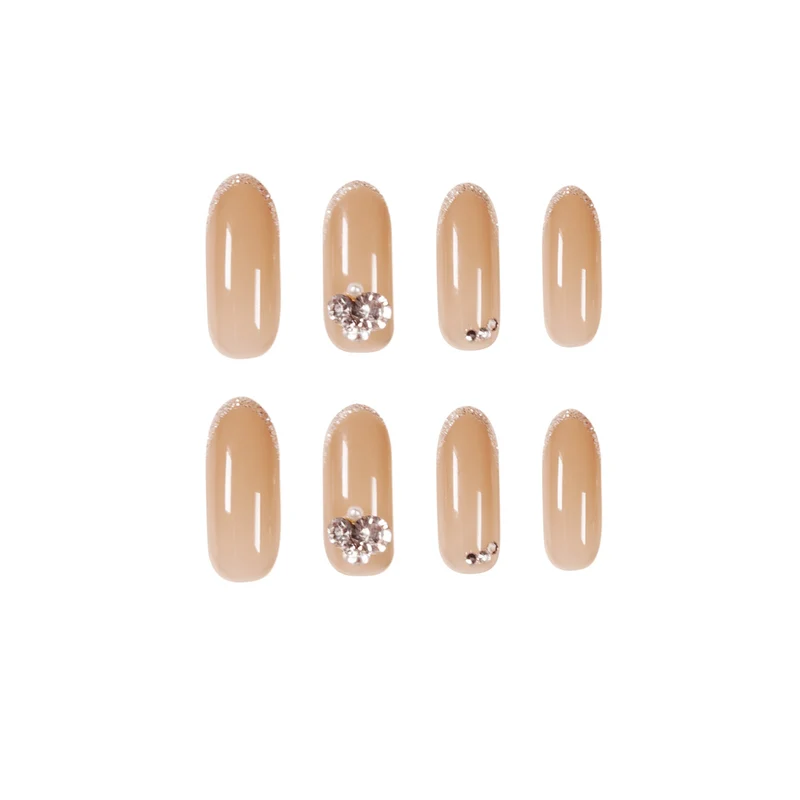 Artful Nail Art with Rhinestone Embellishments Stornfield