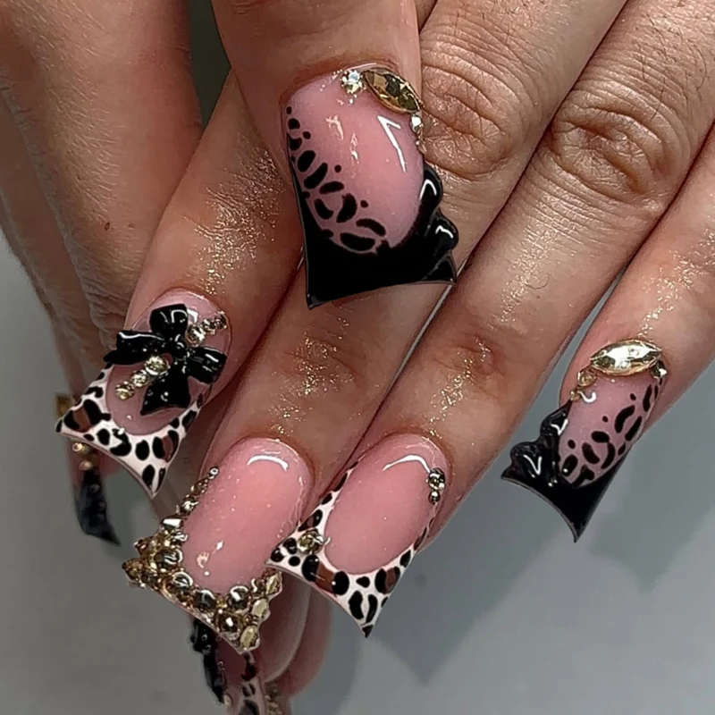 Artful Nail Art with Rhinestones and Animal Accents Stornfield