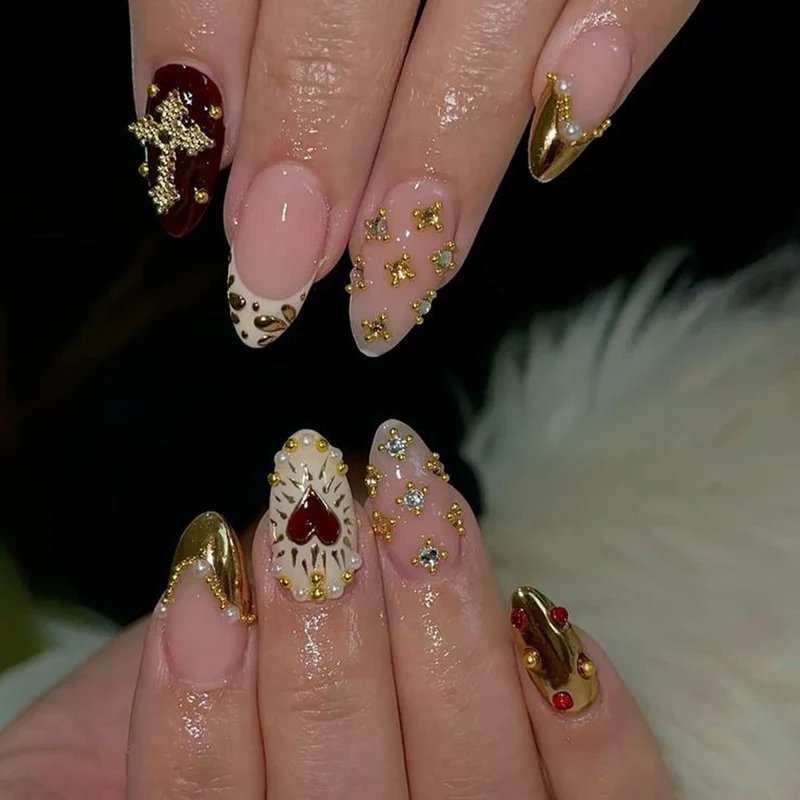 Artful nail art with rhinestone and gold accents Stornfield