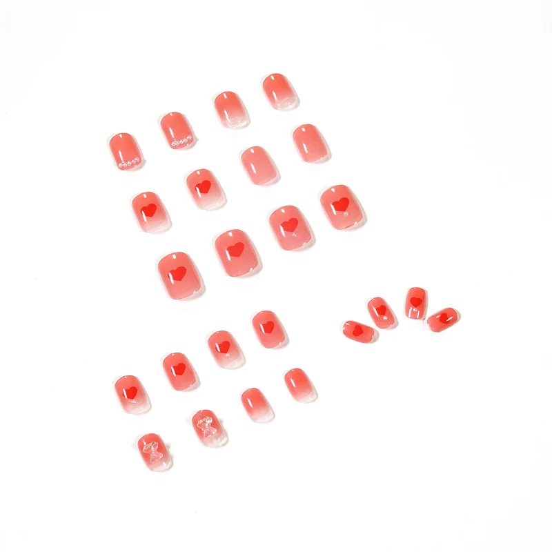 Artful nail art with radiant shine and heart motifs Stornfield
