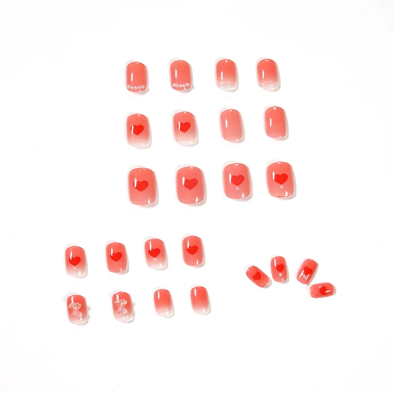 Artful nail art with radiant shine and heart motifs Stornfield