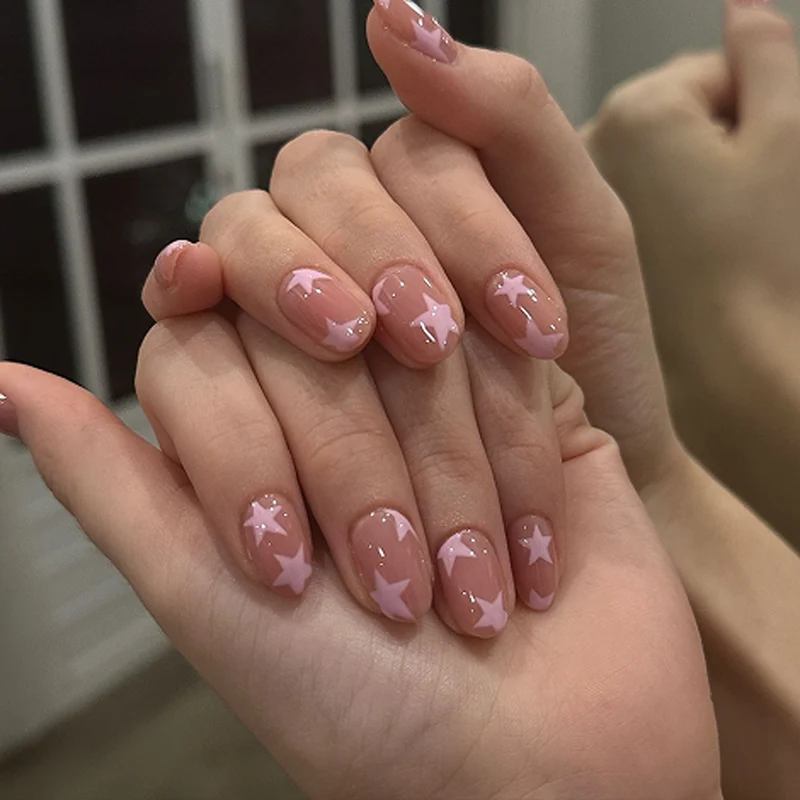 Artistic Nail Art with Star Motifs Stornfield
