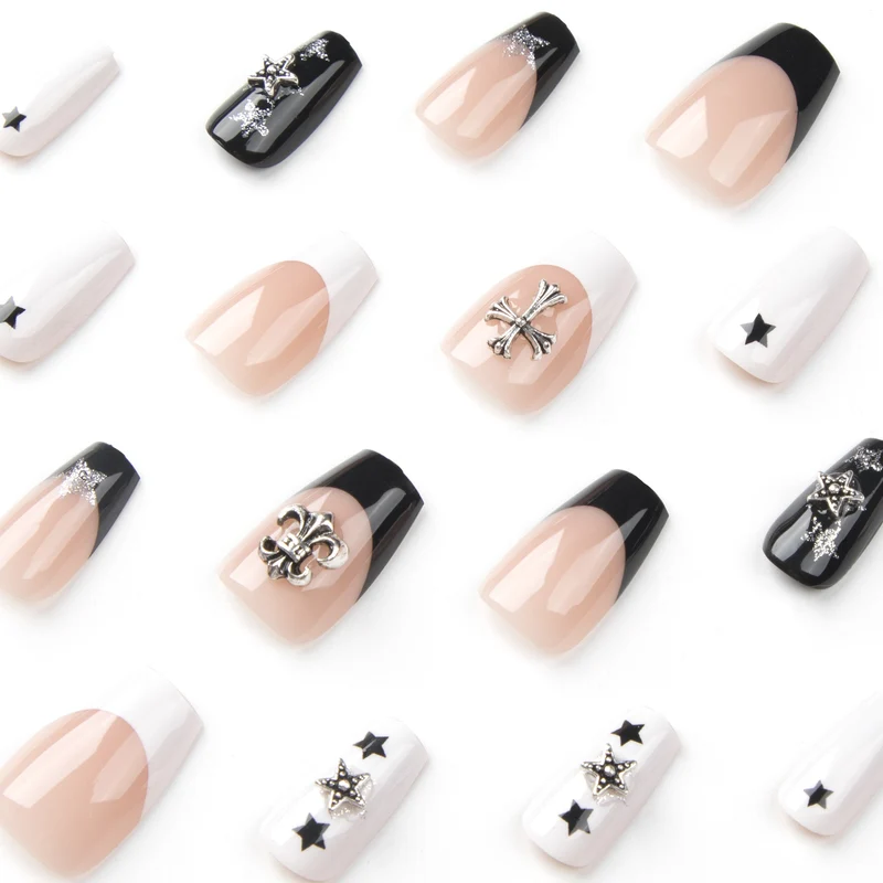 Artful nail art with star motifs and glitter accents Stornfield