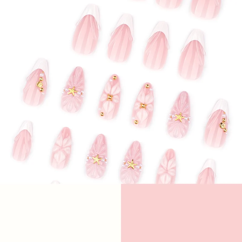 Artful nail art with shell and flower accents Stornfield