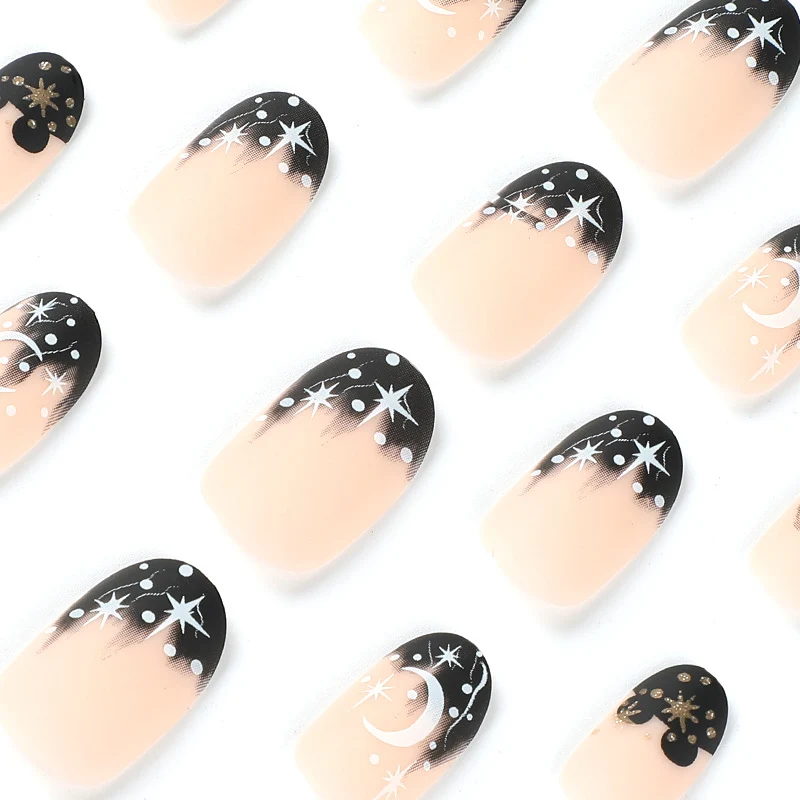 Artistic nail art with moon and star motifs Stornfield