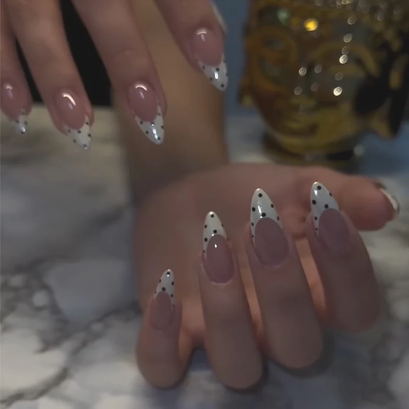Artful Nail Art with Modern Dots and Elegant Lace Stornfield
